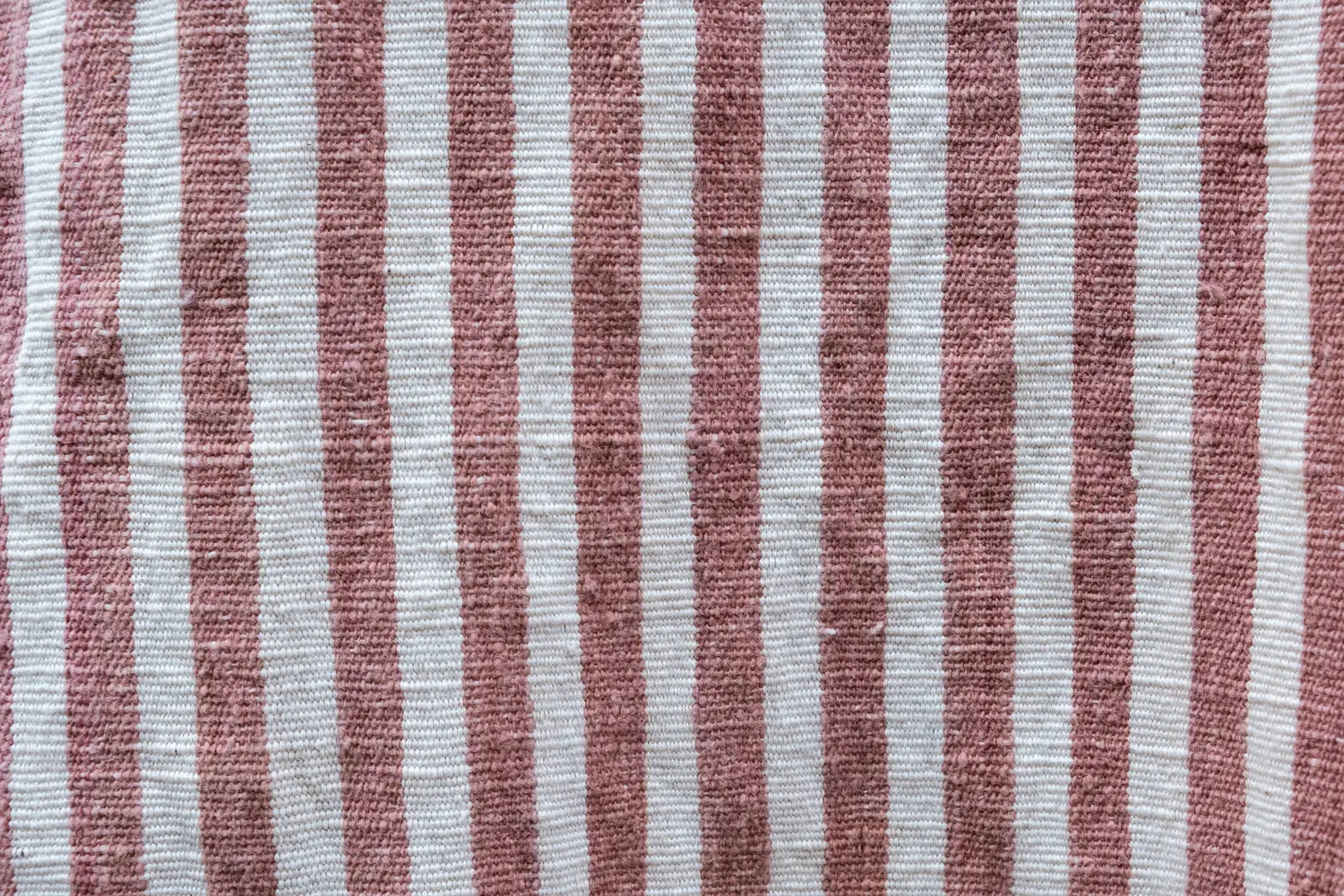 Close-up of red and white striped fabric texture